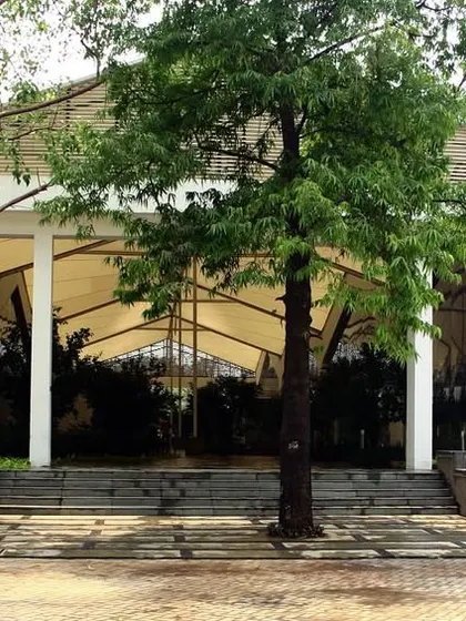 The entrance to the TCS Software Development Centre at Yantra Park, a project where we transformed an industrial site into a collaborative campus. The design retained and reinterpreted former factory sheds, an early example of our work in adaptive reuse.