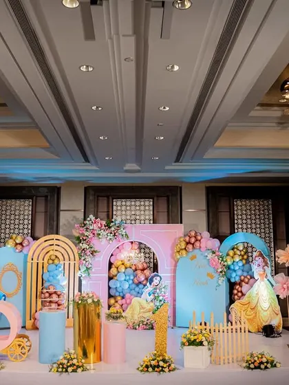 A grand princess-themed stage with Cinderella and Belle, featuring dry ice for a magical, cloudy effect.