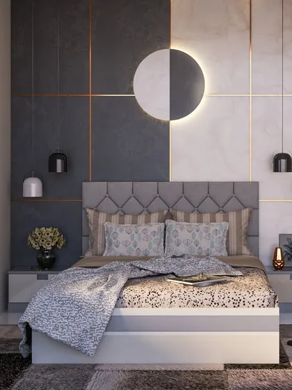 A bedroom concept featuring a striking split-tone accent wall in black and white marble. The hanging pendant lights and tufted headboard create a sophisticated and modern look.