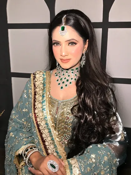 A seated portrait that captures the grace and poise of the bride.