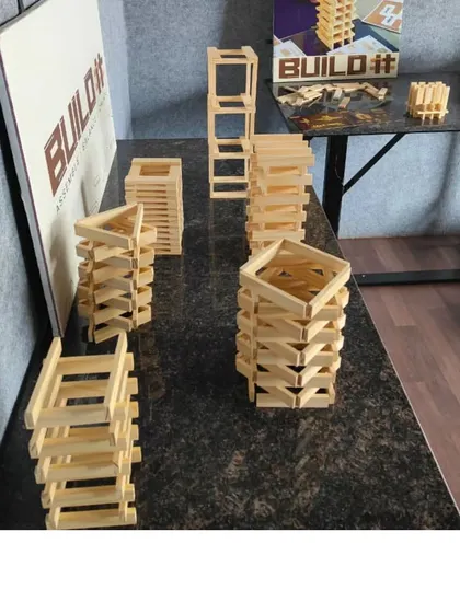 More examples of the diverse structures built in our sessions. Each one reflects a different approach to problem-solving, from triangular bases for stability to spiraling patterns for aesthetic appeal.