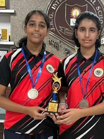 Vaishnavi Trivedi and her teammate with their Silver Medal and trophy from the U-19 Girls team event at the CBSE Cluster Championship. We are proud of their hard-fought matches and excellent performance.