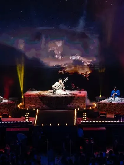 On stage with my full band of incredible musicians. For larger shows, we expand the sound with bass, guitar, keys, and a variety of Indian and Western percussion to create a rich, orchestral fusion.