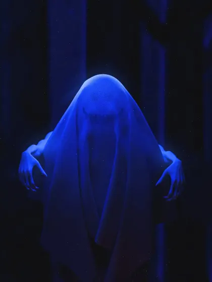 A tighter shot of the blue ghost from my Halloween special. This view emphasizes the texture of the sheet and the creepy hands, making the figure more menacing and mysterious.