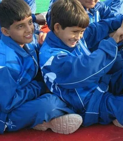 A candid moment with some of my youngest students. While we train hard, we also make sure there is time for fun and friendship.