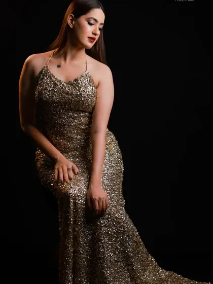 Shine bright in this dazzling gold sequin halter gown. This is the ultimate party dress, perfect for New Year's Eve, a bachelorette, or any celebration.
