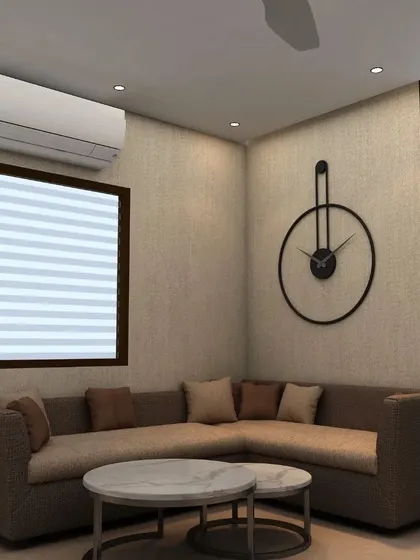 The informal meeting area within the director's cabin features a comfortable L-shaped sofa and nested coffee tables. This space is designed for relaxed conversations, reflecting a modern approach to corporate leadership.