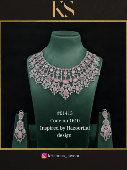 This Hazoorilal-inspired set is available in a soft baby pink, offering a modern and romantic feel.