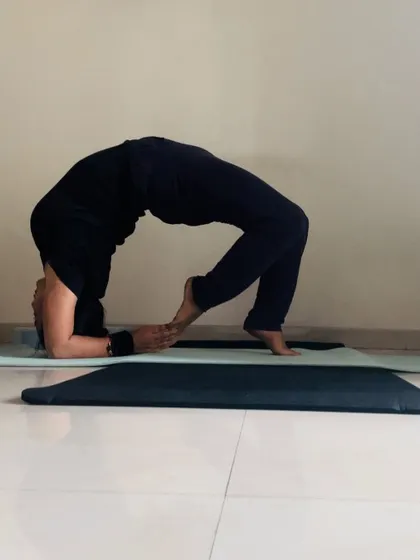 Opening up the heart chakra with a deep forearm wheel pose. This asana creates a beautiful arch in the spine, stimulating energy flow.