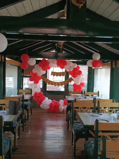 We can turn any location into a celebration space, even a boat. This was a unique anniversary decoration we did inside the Shikara Hotel boat in Navi Mumbai, creating an intimate and memorable setting.