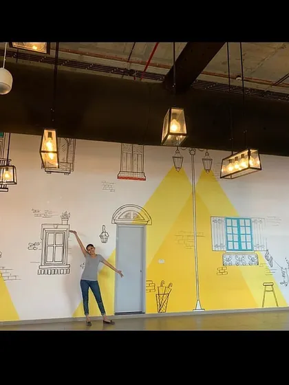 The completed 67-foot mural at the Wipro office in Bangalore. This was a technically challenging project that involved replicating a detailed design inch-by-inch onto a massive wall.