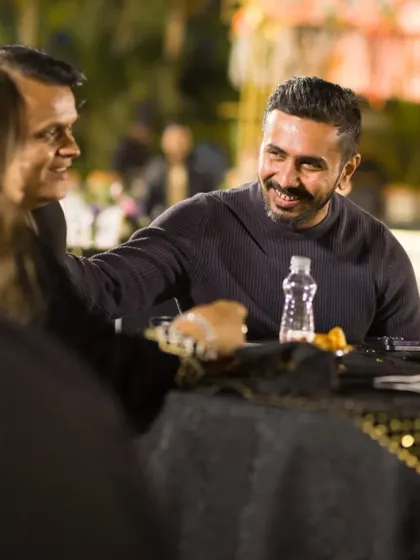 An illustrated scene of our director enjoying a meal with guests. This artwork conveys the warm, personal, and friendly atmosphere we strive to create at every event.