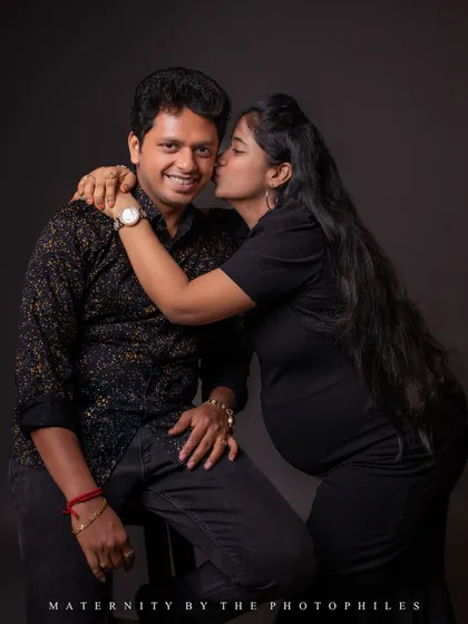 A sweet and spontaneous kiss. These are the candid moments we love to capture in the studio between more posed shots.