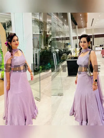 A client looking lovely in a lavender lehenga with a sequined crop top. The ruffled skirt adds a playful touch to this elegant evening outfit.