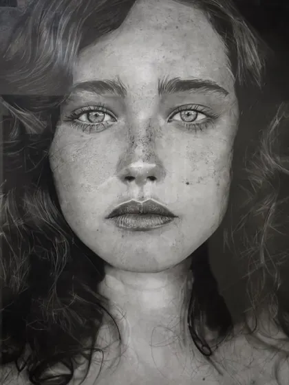 This is one of my most detailed hyper-realistic portraits, created using charcoal. It took over a year to complete, working on and off, and shows the level of depth and emotion I aim for in my realistic pencil and charcoal drawings.