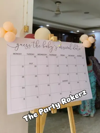 A fun and interactive "Guess the baby's arrival date" calendar, a great addition to any baby shower party.