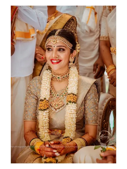 The beautiful Milana Nagaraj on her wedding day. I had the pleasure of designing her blouse to go with this exquisite tissue Kanjeevaram saree, creating a look of pure gold and timeless elegance.
