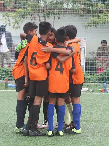 Team huddle! Unity and teamwork on full display at our Summer Camp. These bonds are forged through shared effort and passion.