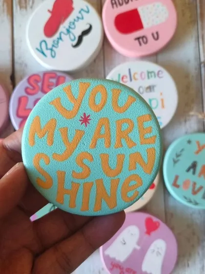 A duplicate of 82, "You are my sunshine." Our collection of quirky, hand-painted wooden magnets is perfect for spreading a little joy and love.