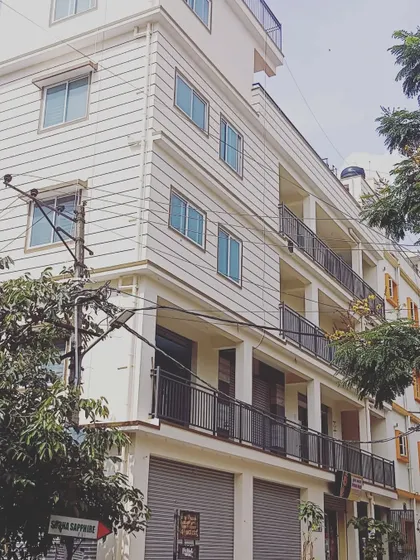 A commercial building located on a South-East corner. We specialize in analyzing and providing solutions for properties with challenging placements, such as corner plots, to maximize their positive potential.