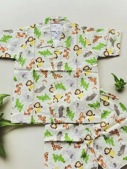 A closer look at our jungle animal print. You can spot monkeys, tigers, crocodiles and more! It's a print that tells a story and sparks imagination.