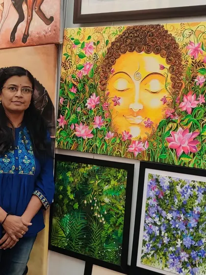 Standing with my paintings at the Haat of Art exhibition.