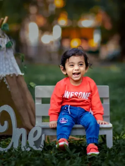 One whole year of giggles, cuddles, and love. This outdoor 'one' shoot has a lovely, rustic feel.