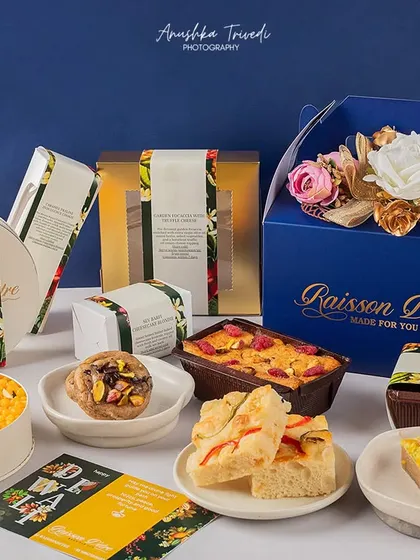 A full spread of Diwali desserts and gift boxes, showcasing a brand's entire festive collection in one shot.