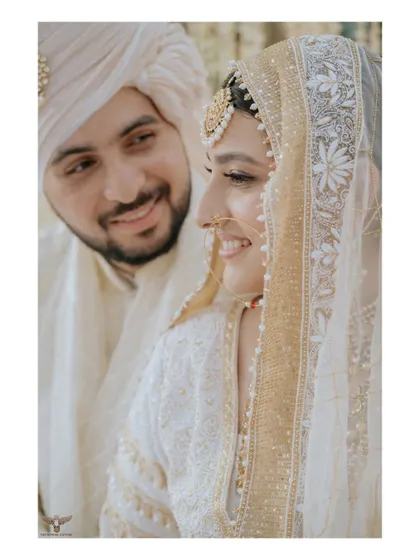 A close-up of the couple during their Nikaah. The groom's adoring gaze and the bride's gentle smile perfectly capture the love and happiness of the moment.
