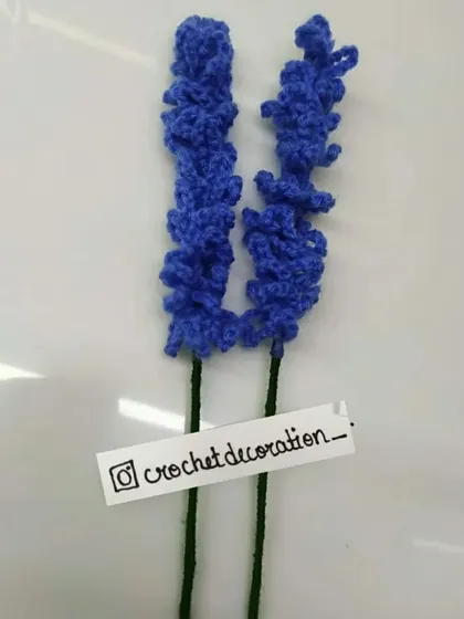 Two stems of our blue lavender flowers. These are perfect for adding height and a touch of rustic charm to your custom bouquet.