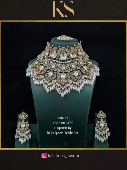 The Rakul Preet-inspired bridal set in a classic all-pearl version. This timeless look is perfect for the bride who loves understated elegance.