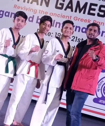 My champions are always ready. Posing with them after their gold medal wins.