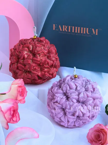 The floral ball candles in festive red and soft lilac. These are made with soy wax and are perfect for gifting or adding a pop of color to your decor.