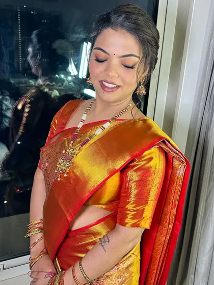 The bride with her eyes closed, showcasing the beautiful and subtle eye makeup.