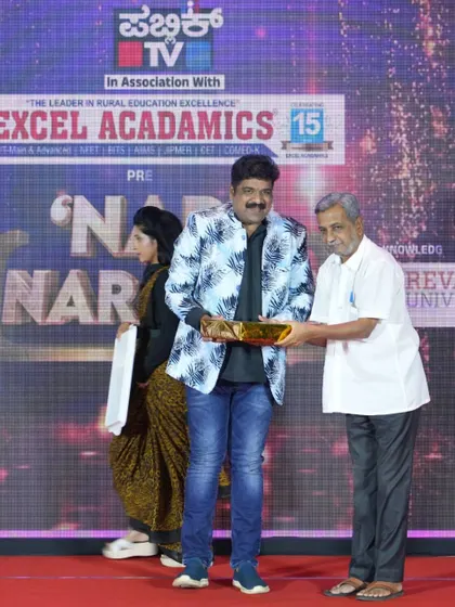 Another moment from the felicitation at the Excel Acadamics event hosted by Public TV. Such moments are very encouraging for an artist.