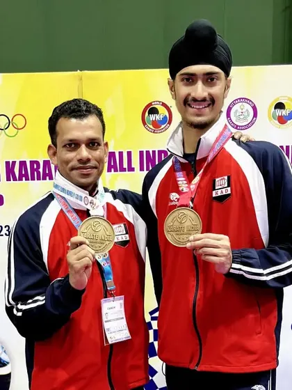 A proud moment with my coach after winning a medal at the Senior National Championship. His guidance has been invaluable since I was 17.