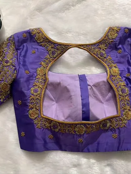 An elegant designer blouse crafted for a client. The intricate detailing and perfect fit exude grace.