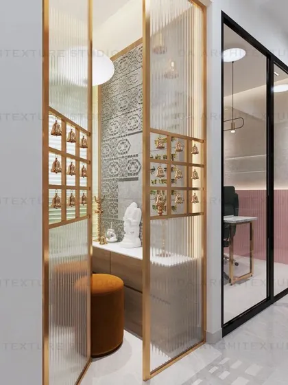 A small temple or prayer area integrated into the office design, featuring fluted glass and decorative bells for a peaceful and spiritual corner.