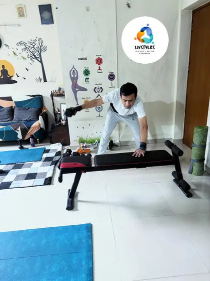 A one-arm dumbbell row is a fantastic exercise for building back strength and correcting posture. Here, I'm demonstrating the proper form using a bench for support, a key part of my strength training program.