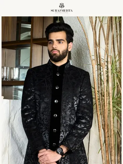 The black textured kurta, a versatile piece for any formal occasion. Its intricate details and meticulous craftsmanship ensure you exude elegance.
