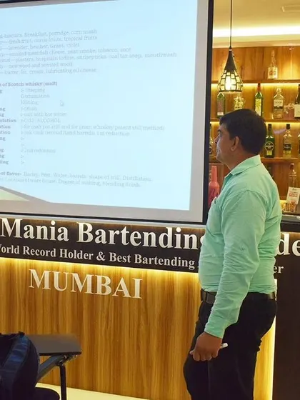 An instructor delivering a presentation during a theory class at our Mumbai academy.