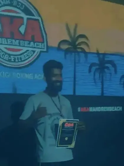 Receiving my certificate for the gold medal win at the American Kickboxing Academy open championship.
