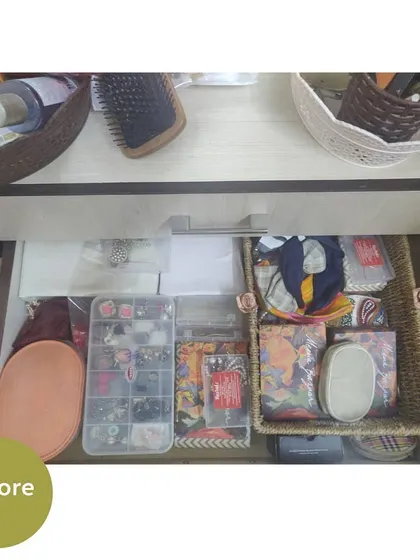Another "before" shot of a drawer filled with jewelry, pouches, and other accessories without any system.