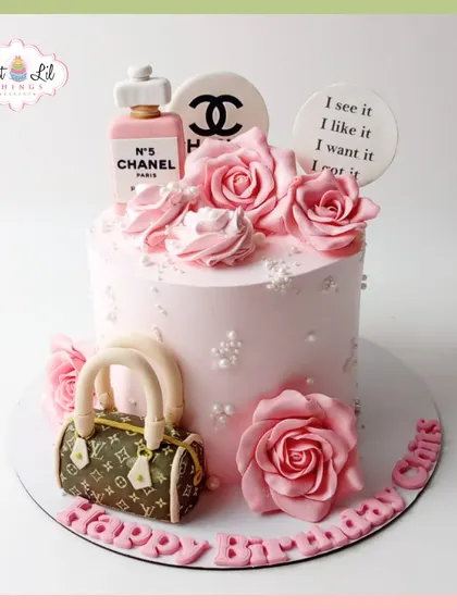 For the fashion lover, this chic cake combines luxury and sweetness. It features edible details inspired by iconic brands like Chanel and Louis Vuitton, delicate sugar roses, and a touch of pearl-like beading, making it a stylish and personalized cake for a sophisticated celebration.