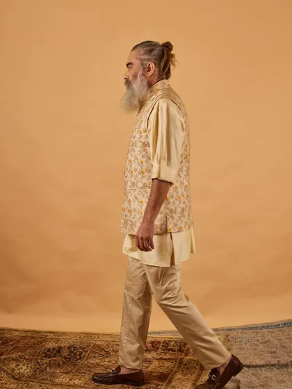 A side profile of the floral vest and kurta, showing the clean lines and comfortable drape of the outfit. It’s a perfect blend of classic and contemporary.