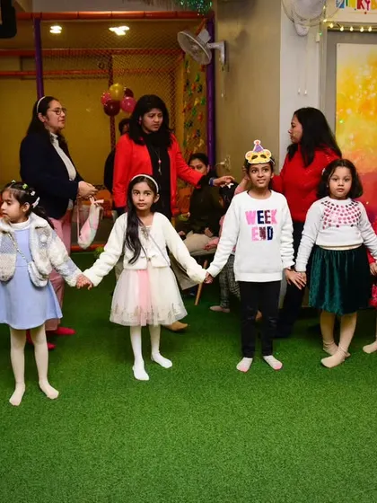 Holding hands and playing together. I love moments like these that show the friendship and connection between the children at our events.