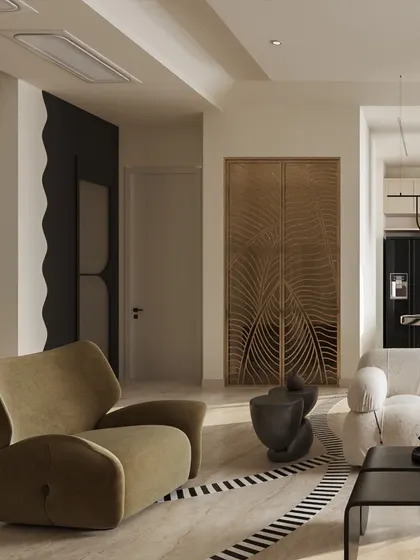This living area is a celebration of artistic expression, blending diverse materials and sculptural forms. A statement carved-wood screen, a wavy black wall feature, and uniquely shaped furniture come together to create a curated, eclectic space.