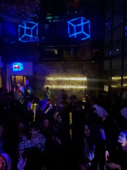 The scene at Bombay Adda, where the decor is as cool as the music. The sign says it all: Bangalore is an Emotion.
