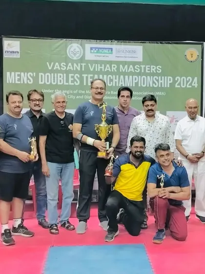 The victorious team, including our coach Prashant Bahatre, celebrating their silver medal win at the Vasant Vihar Masters Team Championship.