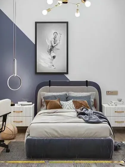 This modern boy's bedroom features a cool blue and white color scheme with a geometric accent wall. We included a comfortable bed, a sleek white desk for studying, and a full wall of wardrobes for ample storage.